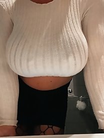 Transgender women in lingerie pose partially nude outdoors