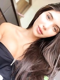 Lustful shemale cutie is walking outdoors