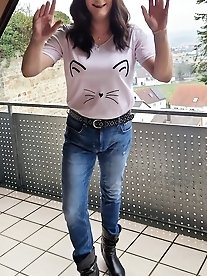 A flexible girl in men s clothes has fun with a cock